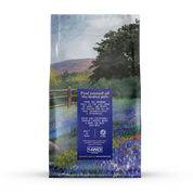 100% Arabica light roast coffee beans with bright floral notes.